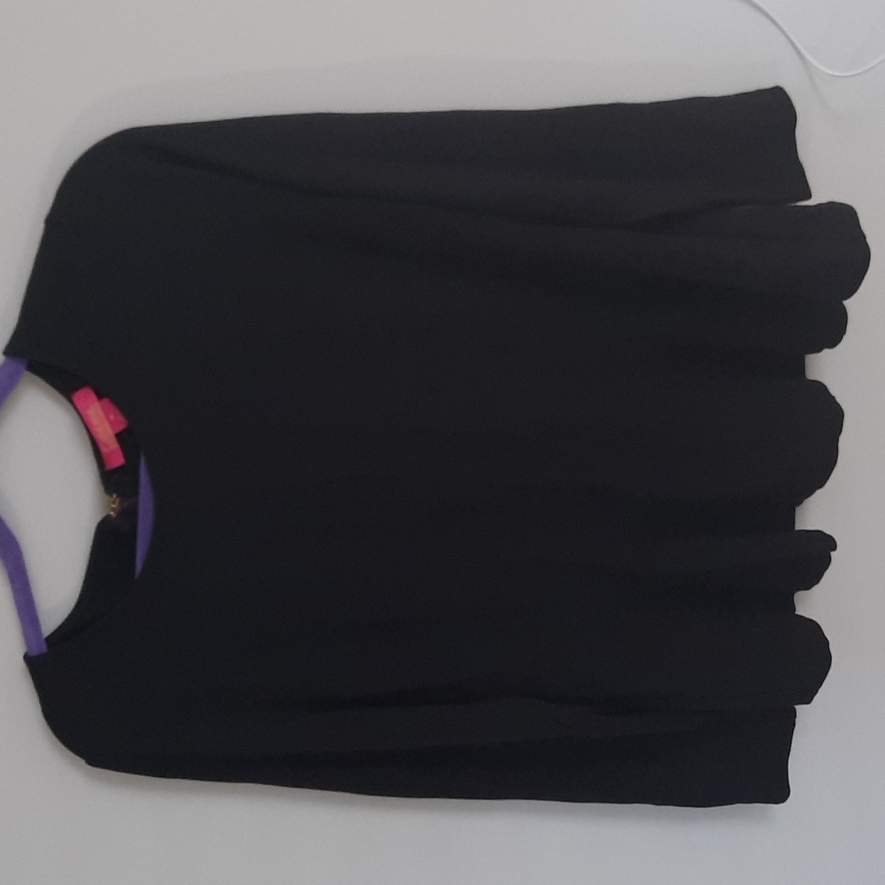 Black long sleeve top with peplum bottom